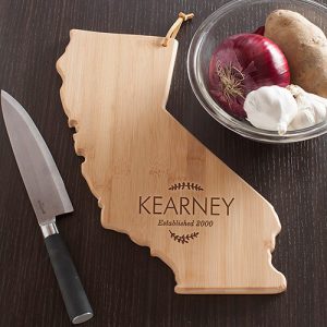 personalized state shaped state pride cutting board family name