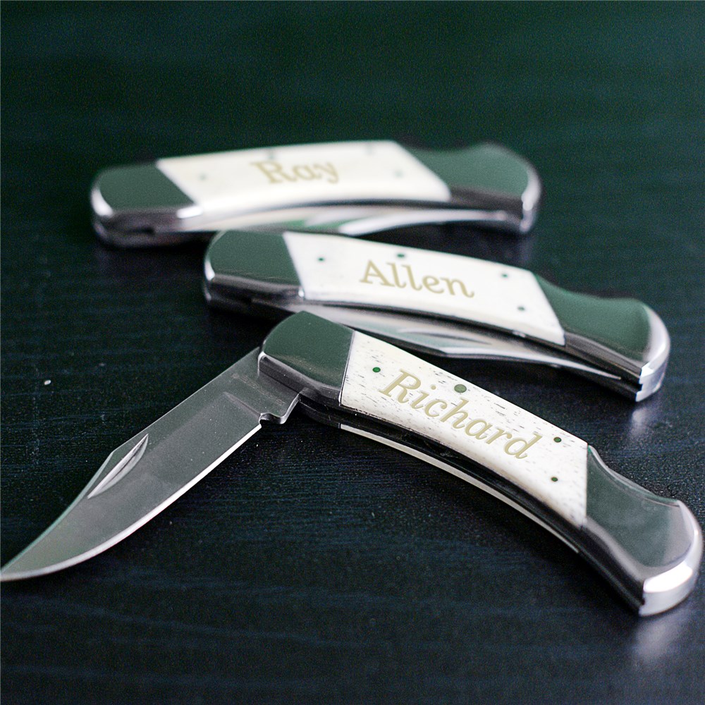 Engraved White Bone Folding Knife L770581