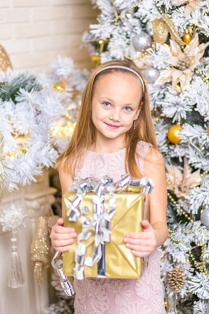 Girl Receiving Perfect Christmas Gift