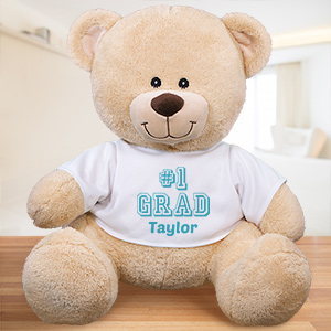 Your # 1 Grad will fall head over heals in love with this adorable teddy bear personalized for them This teddy bear is wearing a t-shirt that may be personalized with any name along with one of our popular school colors. A Teddy Bear Keepsake like this for your new graduate is sure to become an instant favorite among all of his or her graduation gifts