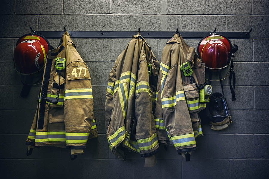 firefighter uniforms hanging up